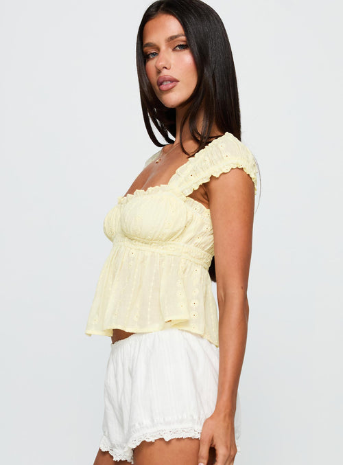 side view of model wearing Princess Polly Summerfield Top Lemon Short Sleeves Square Neck 